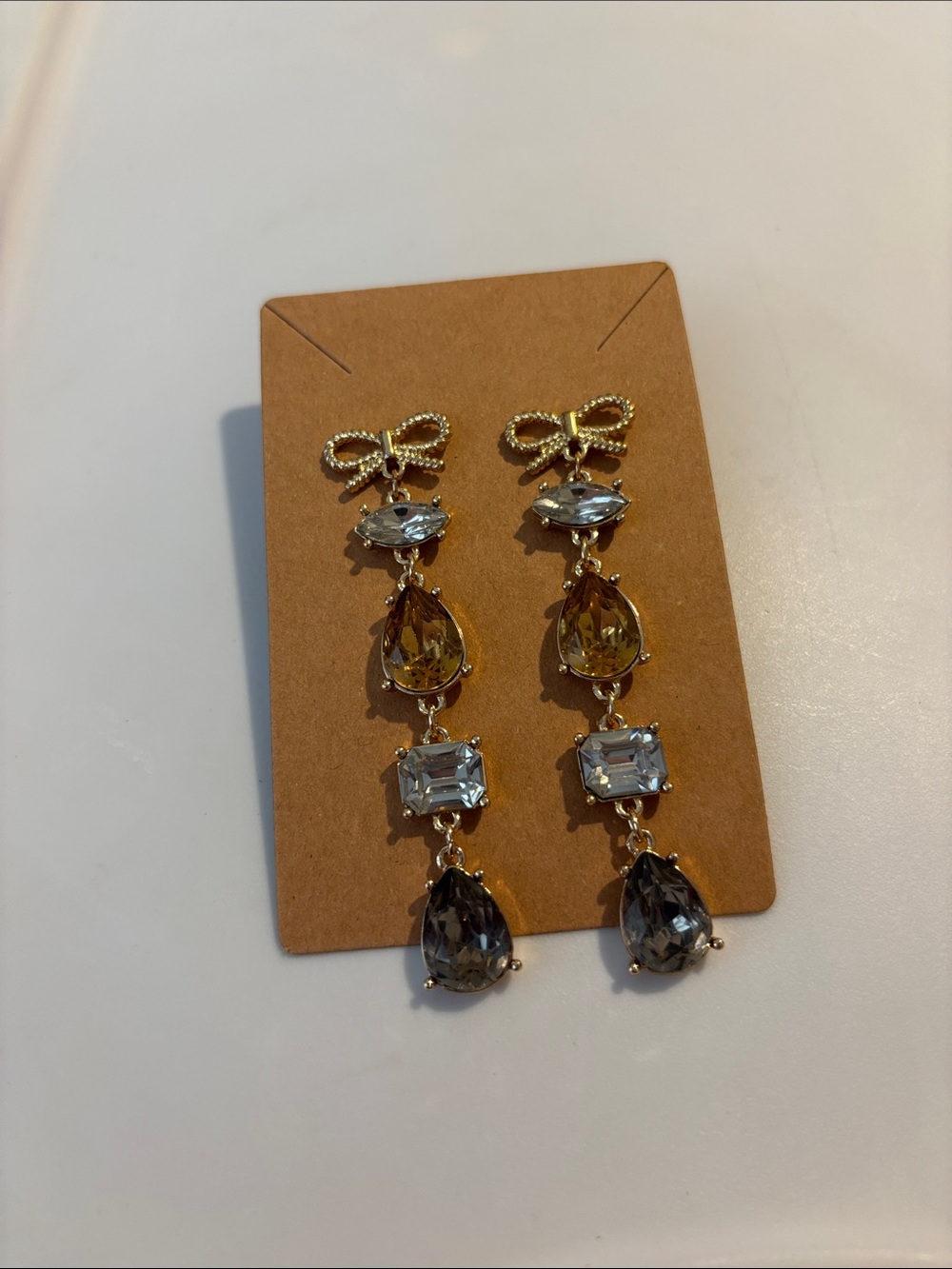 Fashion Jewelry Gold Bow Drop Earrings with Yellow and Gray Stones - Picture 2 of 4